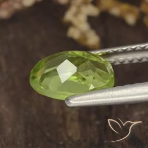 Peridoto Verde medio natural de 1.38 ct, Ovalada, VS