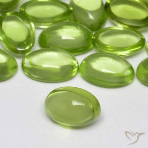 Peridoto Verde vivo claro natural de 0.52 ct, Ovalada, Transparente
