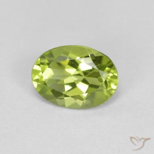 Peridoto Verde vivo natural de 0.86 ct, Ovalada, VS