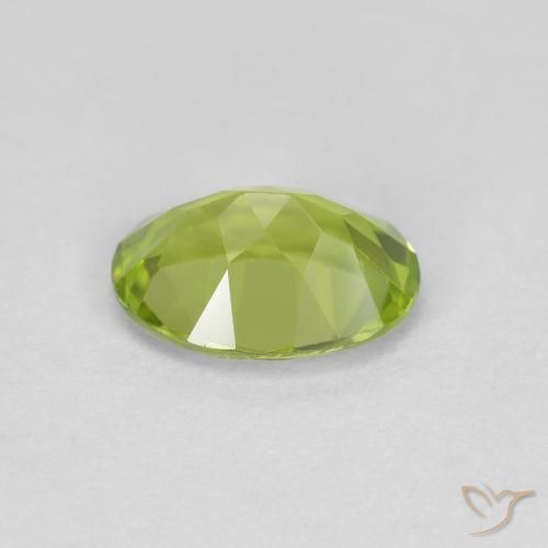 Peridoto Verde vivo natural de 0.86 ct, Ovalada, VS