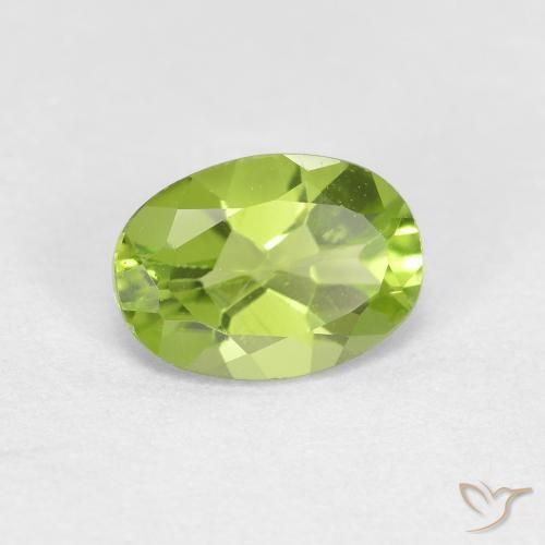 Peridoto Verde vivo natural de 0.88 ct, Ovalada, VS