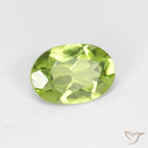 Peridoto Verde medio natural de 0.83 ct, Ovalada, VS