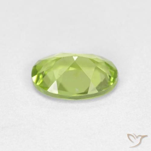 Peridoto Verde medio natural de 0.83 ct, Ovalada, VS