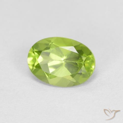 Peridoto Verde vivo natural de 0.91 ct, Ovalada, VS
