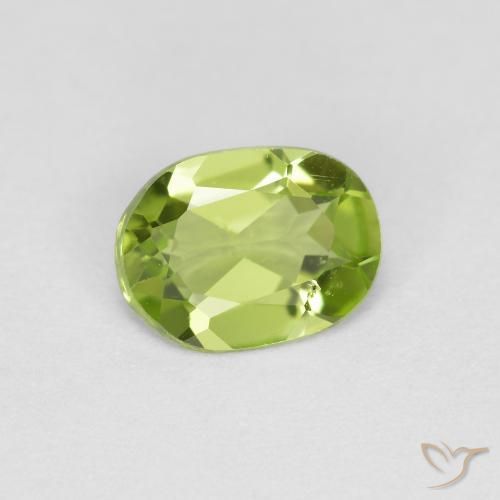 Peridoto Verde vivo natural de 0.71 ct, Ovalada, VS
