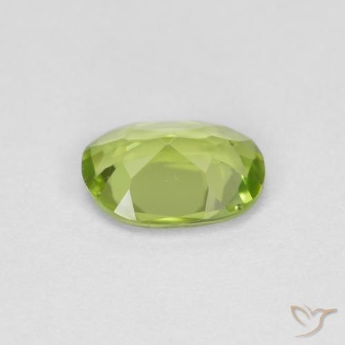 Peridoto Verde vivo natural de 0.71 ct, Ovalada, VS
