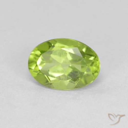 Peridoto Verde vivo natural de 0.92 ct, Ovalada, VS