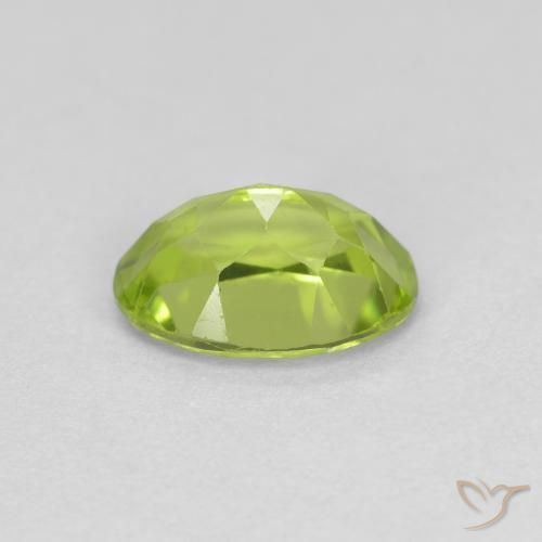 Peridoto Verde vivo natural de 0.92 ct, Ovalada, VS