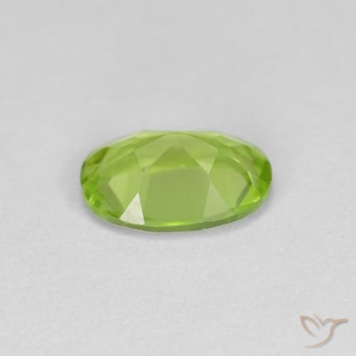 Peridoto Verde medio natural de 0.81 ct, Ovalada, VS