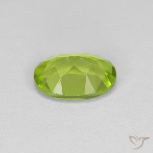 Peridoto Verde vivo natural de 0.91 ct, Ovalada, VS