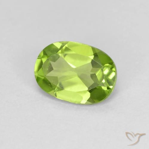Peridoto Verde amarillento natural de 0.89 ct, Ovalada, VS