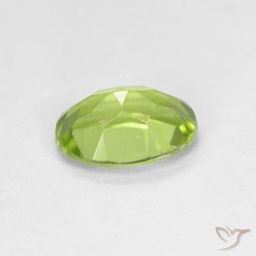 Peridoto Verde vivo natural de 0.93 ct, Ovalada, VS
