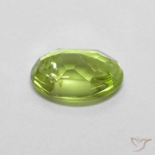 Peridoto Verde medio natural de 0.84 ct, Ovalada, Transparente
