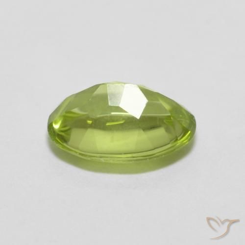 Peridoto Verde vivo natural de 0.78 ct, Ovalada, Transparente
