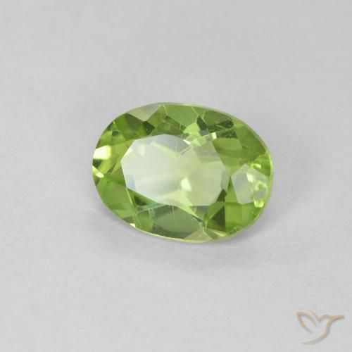 Peridoto Verde medio natural de 0.83 ct, Ovalada, VVS-VS