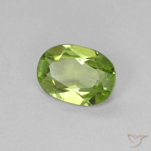 Peridoto Verde medio natural de 0.79 ct, Ovalada, VVS-VS