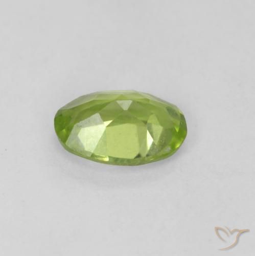 Peridoto Verde medio natural de 0.59 ct, Ovalada, VVS