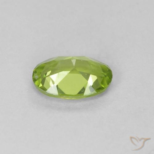Peridoto Verde vivo natural de 0.67 ct, Ovalada, VS