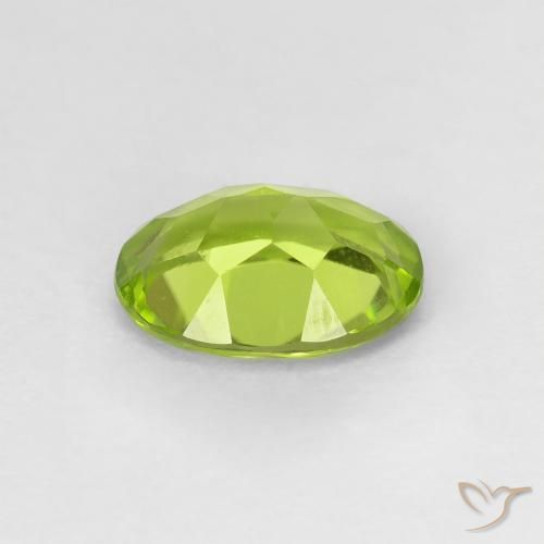 Peridoto Verde amarillento intenso natural de 1.24 ct, Ovalada, VS