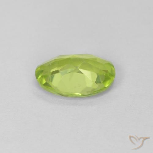 Peridoto Verde medio natural de 0.84 ct, Ovalada, VS