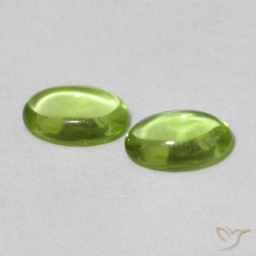 Gemas de Peridoto Verde medio natural de 0.89 ct, Ovalada, Transparente
