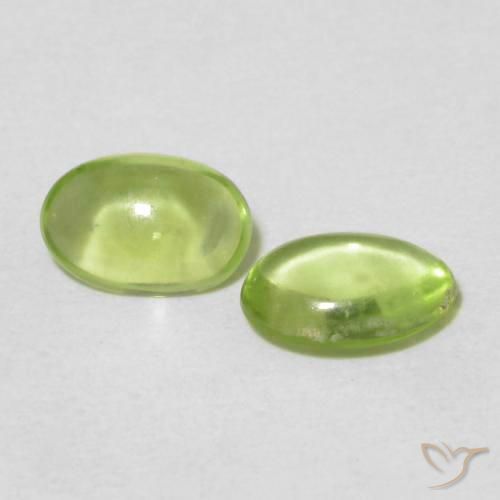 Gemas de Peridoto Verde medio natural de 0.84 ct, Ovalada, Transparente