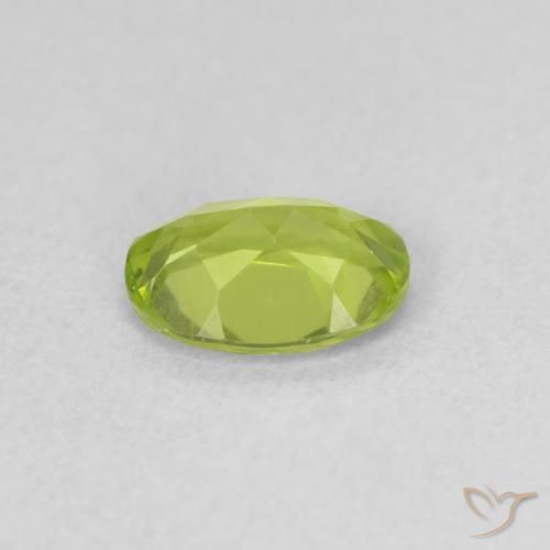 Peridoto Verde medio natural de 0.86 ct, Ovalada, VVS-VS