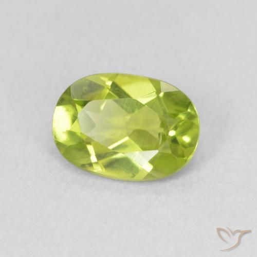 Peridoto Verde amarillento intenso natural de 0.91 ct, Ovalada, VS