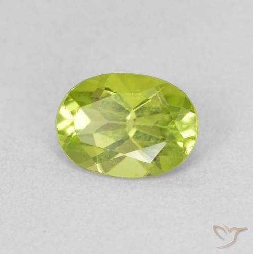 Peridoto Verde amarillento intenso natural de 0.87 ct, Ovalada, VS