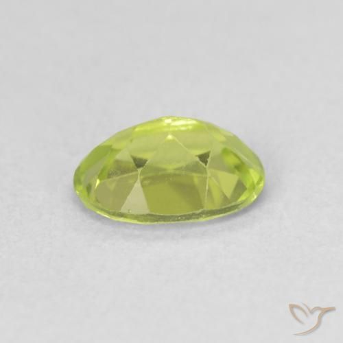 Peridoto Verde amarillento intenso natural de 0.87 ct, Ovalada, VS