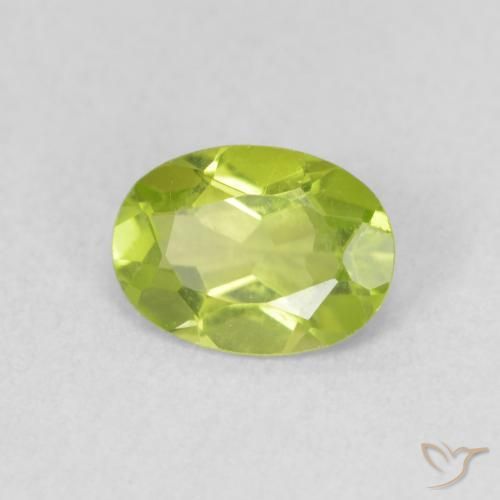 Peridoto Verde amarillento intenso natural de 0.81 ct, Ovalada, VS