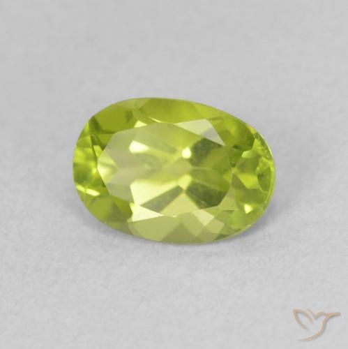 Peridoto Verde amarillento intenso natural de 0.98 ct, Ovalada, VS