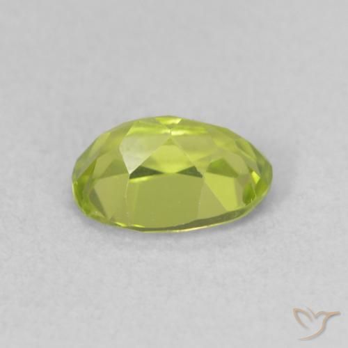Peridoto Verde amarillento intenso natural de 0.98 ct, Ovalada, VS