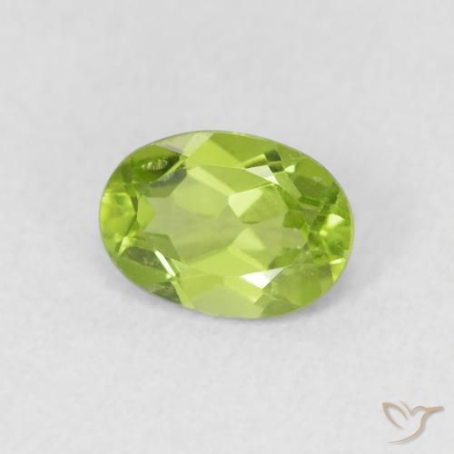 Peridoto Verde vivo natural de 0.91 ct, Ovalada, VS