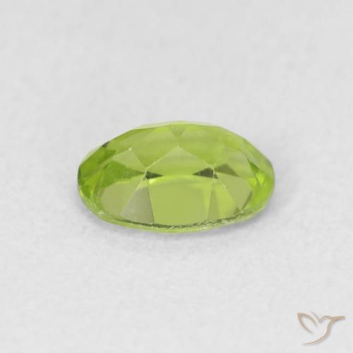 Peridoto Verde vivo natural de 0.91 ct, Ovalada, VS