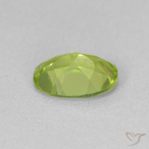Peridoto Verde vivo natural de 0.88 ct, Ovalada, VS