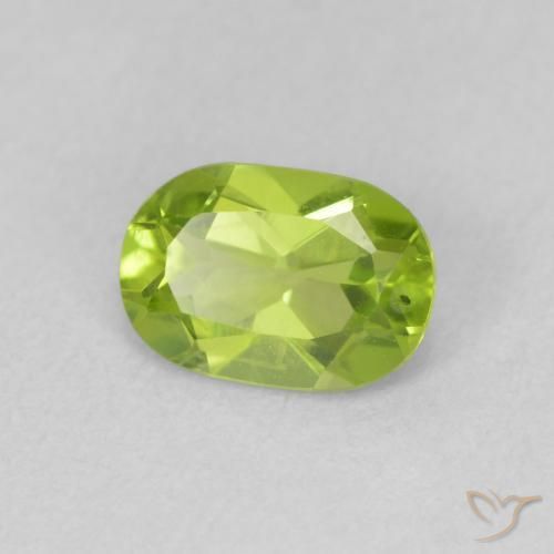 Peridoto Verde amarillento intenso natural de 0.86 ct, Ovalada, VS