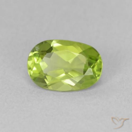 Peridoto Verde amarillento intenso natural de 0.84 ct, Ovalada, VS