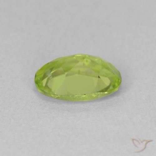 Peridoto Verde amarillento intenso natural de 0.84 ct, Ovalada, VS