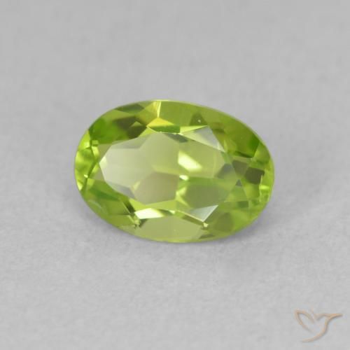 Peridoto Verde vivo natural de 0.96 ct, Ovalada, VS