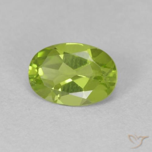 Peridoto Verde vivo natural de 0.76 ct, Ovalada, VVS