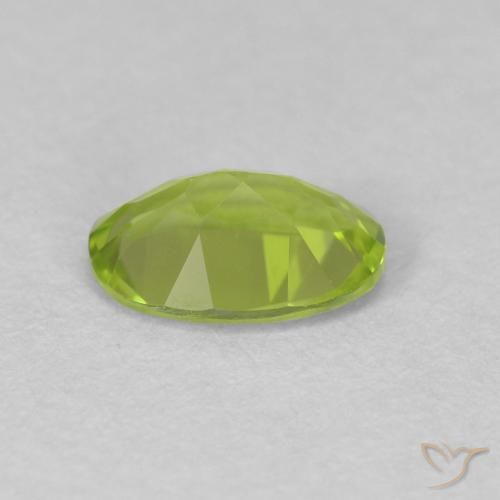 Peridoto Verde vivo natural de 0.76 ct, Ovalada, VVS