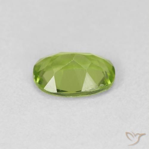 Peridoto Verde medio natural de 0.88 ct, Ovalada, VVS-VS