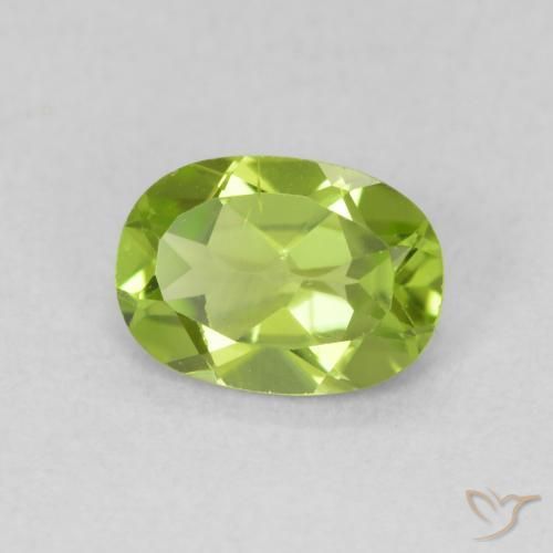 Peridoto Verde vivo natural de 0.84 ct, Ovalada, VS