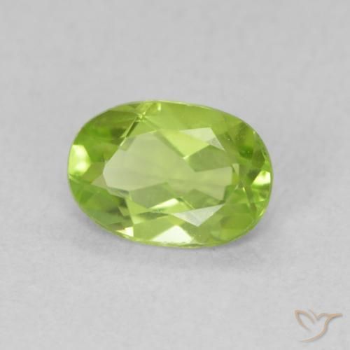 Peridoto Verde vivo natural de 0.85 ct, Ovalada, VS
