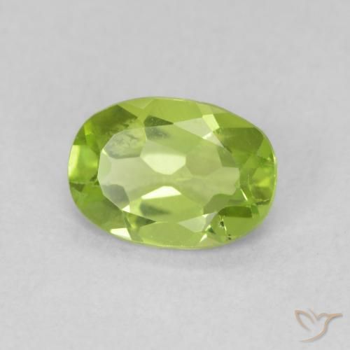 Peridoto Verde medio natural de 0.83 ct, Ovalada, VS