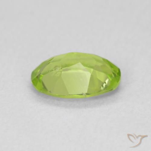 Peridoto Verde medio natural de 0.83 ct, Ovalada, VS