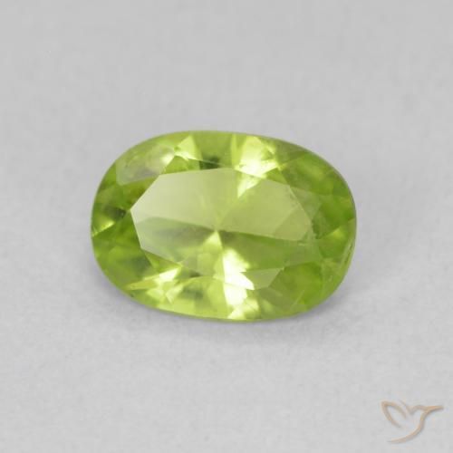 Peridoto Verde vivo natural de 0.80 ct, Ovalada, VS