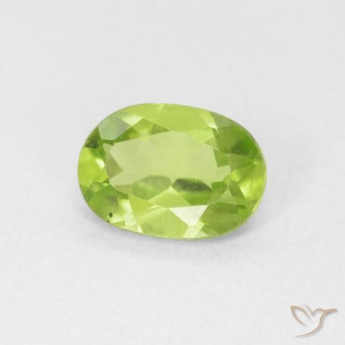 Peridoto Verde vivo natural de 0.86 ct, Ovalada, VS