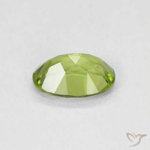 Peridoto Verde medio natural de 0.88 ct, Ovalada, VVS-VS
